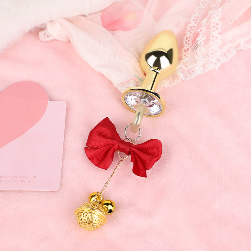 Jeweled Bow Butt Plug with Bell Charm | Sensual Dangling Anal Toy Description