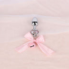 Jeweled Bow Butt Plug with Bell Charm | Sensual Dangling Anal Toy Description