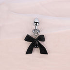 Jeweled Bow Butt Plug with Bell Charm | Sensual Dangling Anal Toy Description